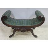 A CONTINENTAL MAHOGANY AND UPHOLSTERED DOUBLE SCROLL END STOOL on carved legs with claw feet