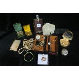 A MISCELLANEOUS COLLECTION to include jewelry evening bags hip flask travelling clock etc