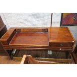 A 19TH CENTURY MAHOGANY AND SATINWOOD CROSS BANDED SIDE TABLE of rectangular outline the shaped top