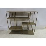 A METAL OPENWORK SHELF joined by tubular uprights 80cm (h) x 90cm (w) x 26cm (d)