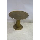 A BRASS DISH TOP TABLE the circular top above a cylindrical spreading column raised on a circular