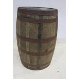 A PAIR OF OAK AND STEEL BOUND BARRELS of typical form 90cm (h) x 50cm (d)