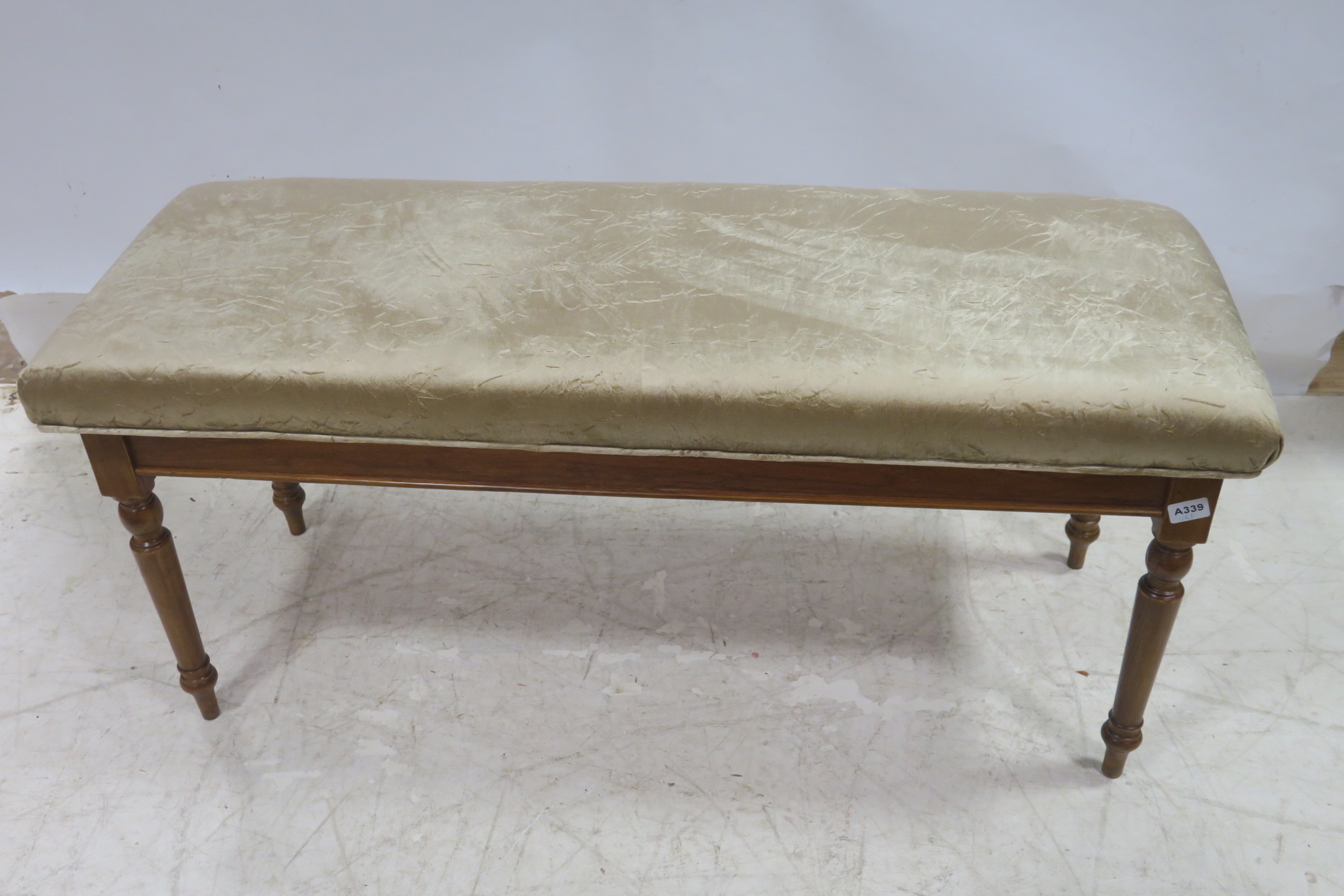 A VICTORIAN DESIGN MAHOGANY UPHOLSTERED STOOL of rectangular outline with upholstered seat 122cm