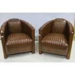 A VERY FINE PAIR OF CHERRYWOOD AND HIDE UPHOLSTERED AVIATION TUB SHAPED CHAIRS with hide