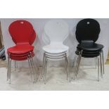 A SET OF TWELVE BENTWOOD CHAIRS each with shaped back and seat on chrome legs comprising four white