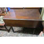 A GEORGIAN MAHOGANY DROP LEAF TABLE the rectangular hinged top with frieze drawer on square moulded