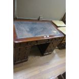 A 19TH CENTURY MAHOGANY PEDESTAL DESK the rectangular tooled leather top with three frieze drawers