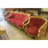 A CONTINENTAL GILTWOOD AND UPHOLSTERED THREE PIECE SUITE,