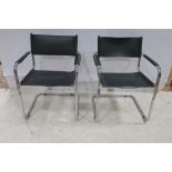 A PAIR OF MART-STAM S-3-4 VINTAGE CHAIRS each with a chrome frame and hide splat and seat