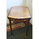 A FINE SHERIDAN DESIGN MAHOGANY AND SATINWOOD CROSS BANDED PEMBROKE TABLE the oval hinged top with