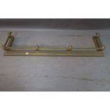 A 19th CENTURY BRASS FENDER,