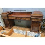 A FINE 19TH CENTURY MAHOGANY PEDESTAL SIDEBOARD of rectangular breakfront outline the shaped top