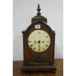 A 19TH CENTURY ROSEWOOD NEO CLASSICAL CASED BRACKET CLOCK the arch case with circular white enamel