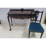 A CHIPPENDALE MAHOGANY SIDE TABLE the rectangular top with gadrooned rim above a carved frieze on