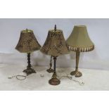FOUR GILT TABLE LAMPS with shades