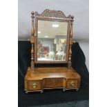 A REGENCY MAHOGANY CRUTCH FRAME MIRROR,