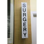 A WALL MOUNTED PERSPEX SURGERY SIGN