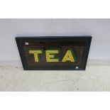 A GOLD LEAF SIGN inscribed Tea in ebonised frame 50cm x 90cm
