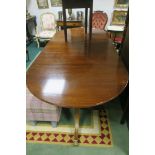 A FINE REGENCY STYLE MAHOGANY DINING TABLE of rectangular outline with rounded ends and one loose