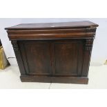 A 19TH CENTURY MAHOGANY SIDE CABINET the rectangular top above a frieze drawer and cupboards on