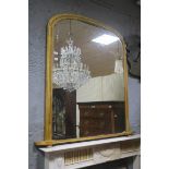 A GOOD 19TH CENTURY GILTWOOD AND GESSO OVERMANTLE MIRROR the rectangular arched plate within a