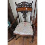 AN ART NOUVEAU DESIGN MAHOGANY INLAID ELBOW CHAIR the pierced carved top rail above an inlaid panel