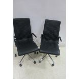 A SET OF THREE DANISH BO CONCEPT BLACK UPHOLSTERED AND CHROME SWIVEL ELBOW CHAIRS