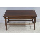 A TEAK COFFEE TABLE of rectangular outline on square tapering legs 49cm (h) x 88cm (w) x 43cm (h)