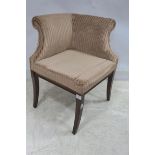 A MAHOGANY AND UPHOLSTERED CORNER CHAIR with scroll over back on sabre legs