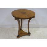 A CONTINENTAL POLLARD OAK AND MARQUETRY OCCASIONAL TABLE the circular top raised on shaped supports