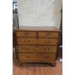 A FINE GEORGIAN MAHOGANY CHEST the rectangular top above two short and three long graduated drawers