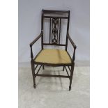 A MAHOGANY INLAID ELBOW CHAIR with pierced vertical splat and upholstered seat on square tapering