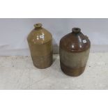 TWO GLAZED POTTERY SPIRIT JARS inscribed N-Carolan & Company Wine Merchants Dundalk and