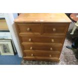 A VICTORIAN DESIGN PINE CHEST of two short and three long drawers on shaped platform base 105cm (h)