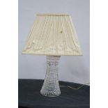 A HOBNAIL CUT GLASS TABLE LAMP with pleated shade 49cm (h)