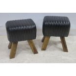 A PAIR OF HIDE UPHOLSTERED FOOTSTOOLS each with a panelled seat on moulded legs 48cm (h) x 38cm (w)