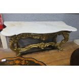 A 19TH CENTURY CAST IRON AND MARBLE CONSOLE TABLE of serpentine outline the shaped veined marble