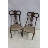 A SET OF FOUR 19TH CENTURY MAHOGANY INLAID SIDE CHAIRS each with a pierced vertical splat and