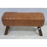 A HIDE UPHOLSTERED AND HARDWOOD PUMMEL HORSE the rectangular form on moulded legs 48cm (h) x 87cm