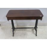 A 19TH CENTURY ROSEWOOD SIDE TABLE the rectangular top with rounded corners raised on spiral twist