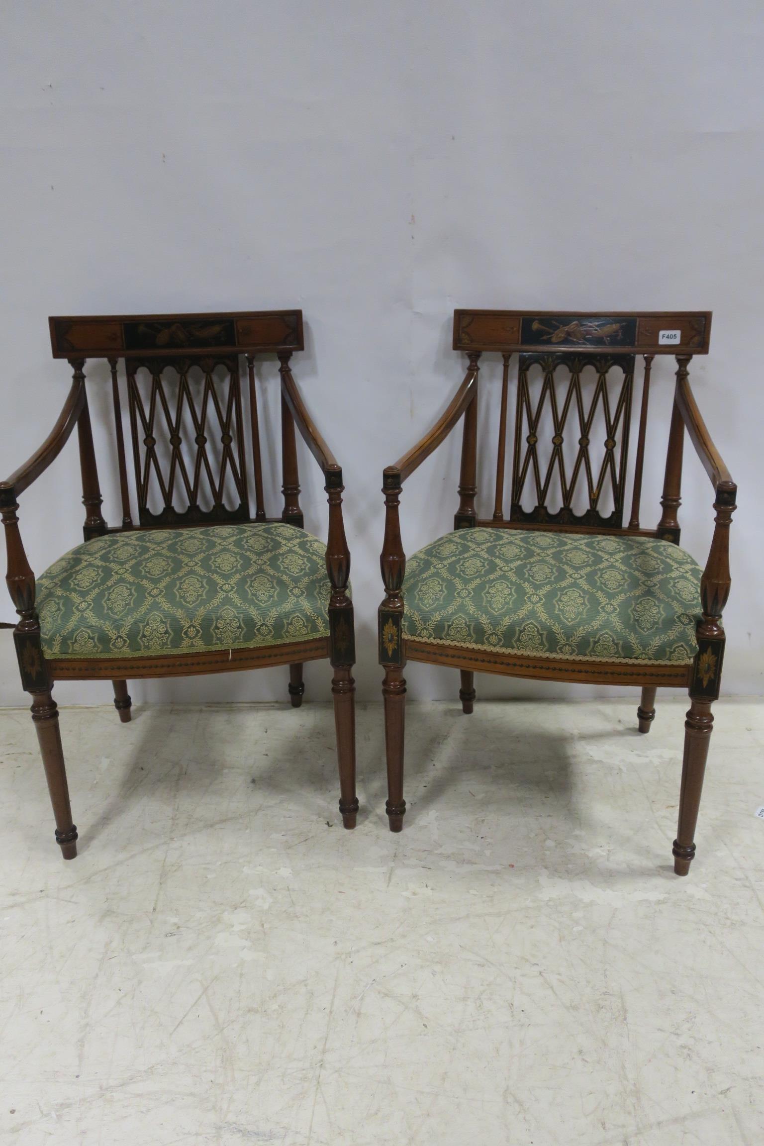 A PAIR OF SATINWOOD AND POLYCHROME ELBOW CHAIRS each with a lattice work pierced splat and