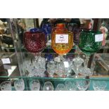 A SET OF SIX CUT GLASS AND COLOURED GLASS WINE GOBLETS