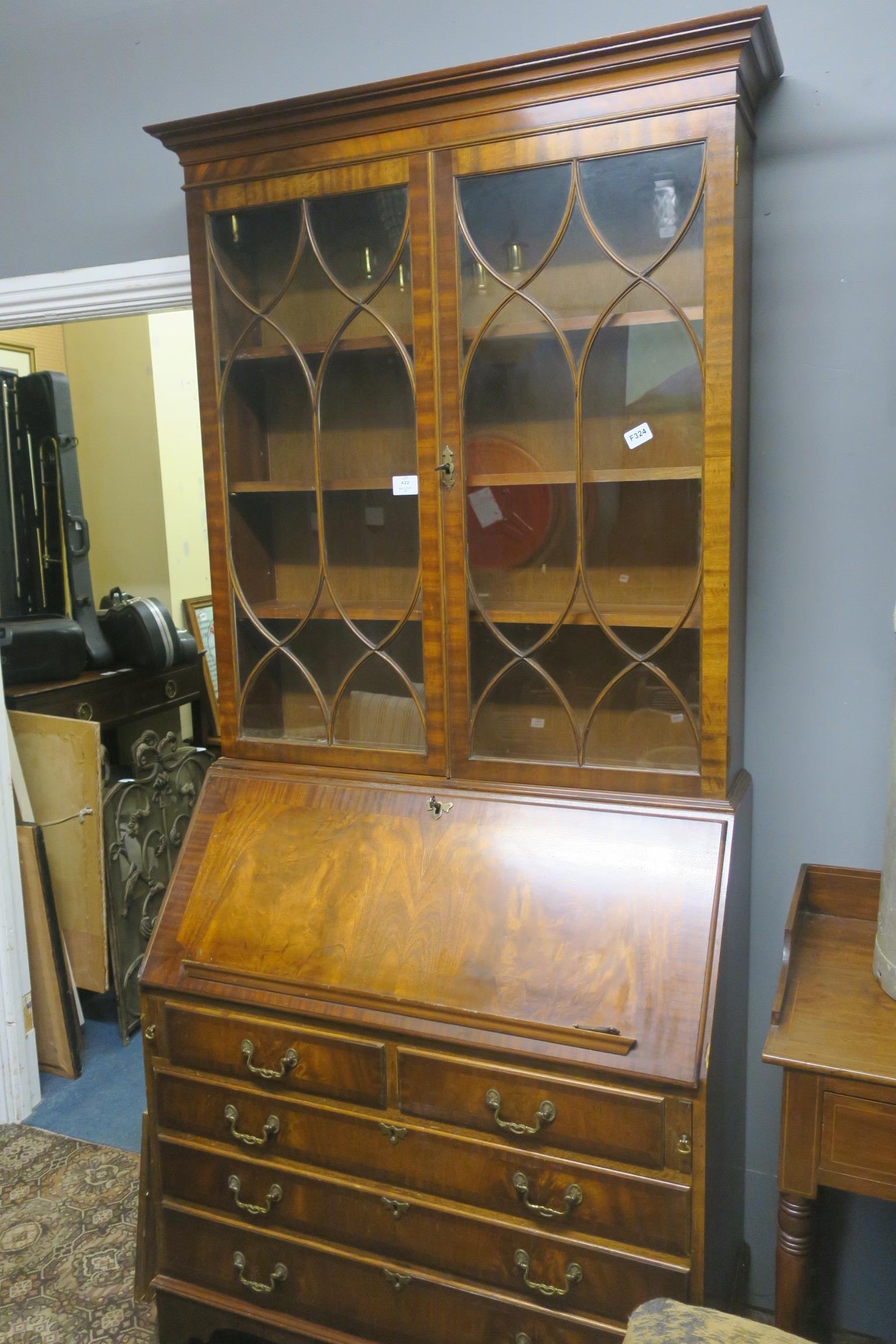 A GEORGIAN DESIGN MAHOGANY BUREAU BOOKCASE the moulded cornice above a pair of astragal glazed