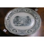 A 19TH CENTURY IRONSTONE MEAT PLATTER the white and grey ground with central panel depicting palace
