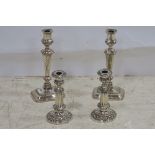 A PAIR OF 19TH CENTURY SILVER PLATE AND COPPER CANDLESTICKS together with a pair of 19th century