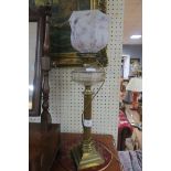 EARLY 20TH CENTURY BRASS COLUMNAR OIL LAMP electrified the clear glass reservoir with shade 66cm