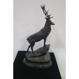 AFTER JULES-MOIGNIEZ A BRONZE FIGURE modelled as a stag shown standing on a naturalistic base