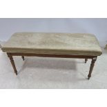 A VICTORIAN DESIGN MAHOGANY UPHOLSTERED STOOL of rectangular outline with upholstered seat 122cm
