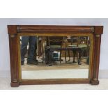 A 19TH CENTURY MAHOGANY AND PARCEL GILT OVER MANTLE MIRROR the rectangular plate within a half