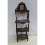 A 19TH CENTURY MAHOGANY AND SATINWOOD INLAID FOUR TIER WHAT NOT each serpentine shelf joined by